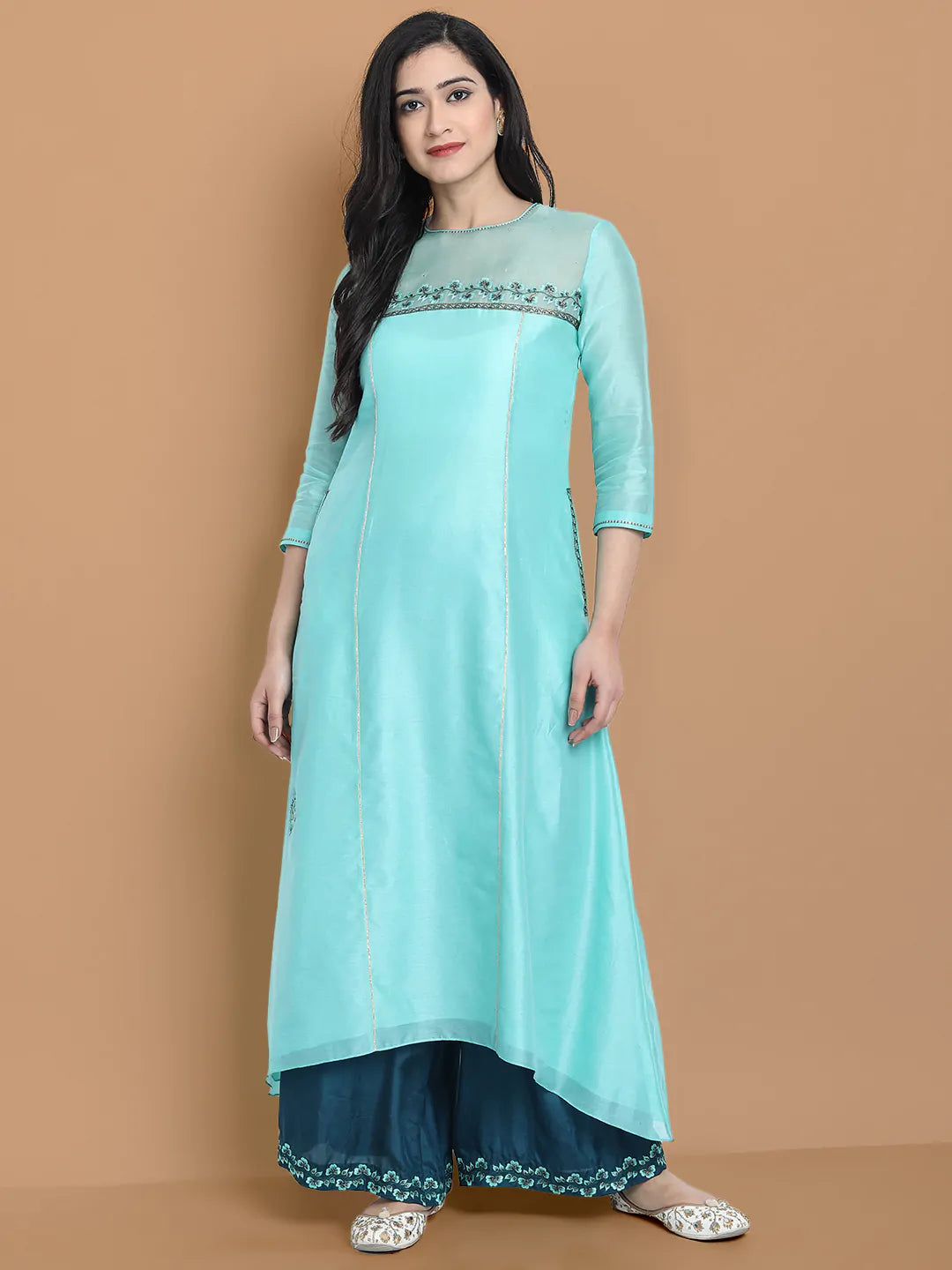 Pastel blue high low kurta with hand and machine embroidery , paired with embroidered wide farshi