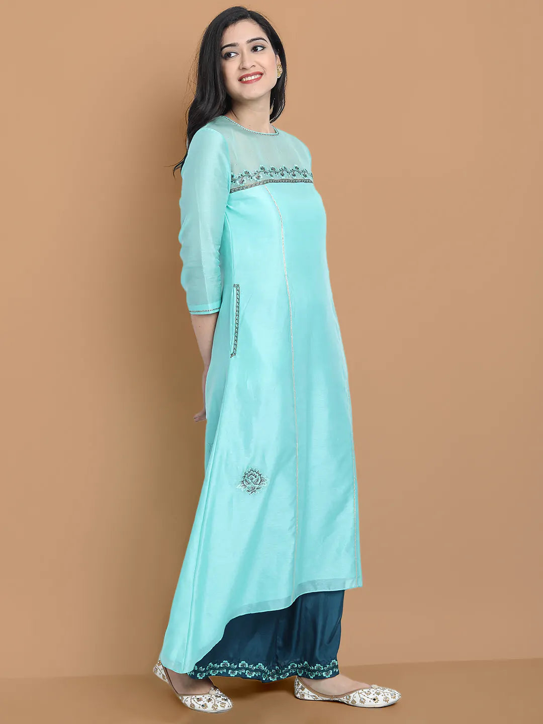 Pastel blue high low kurta with hand and machine embroidery , paired with embroidered wide farshi