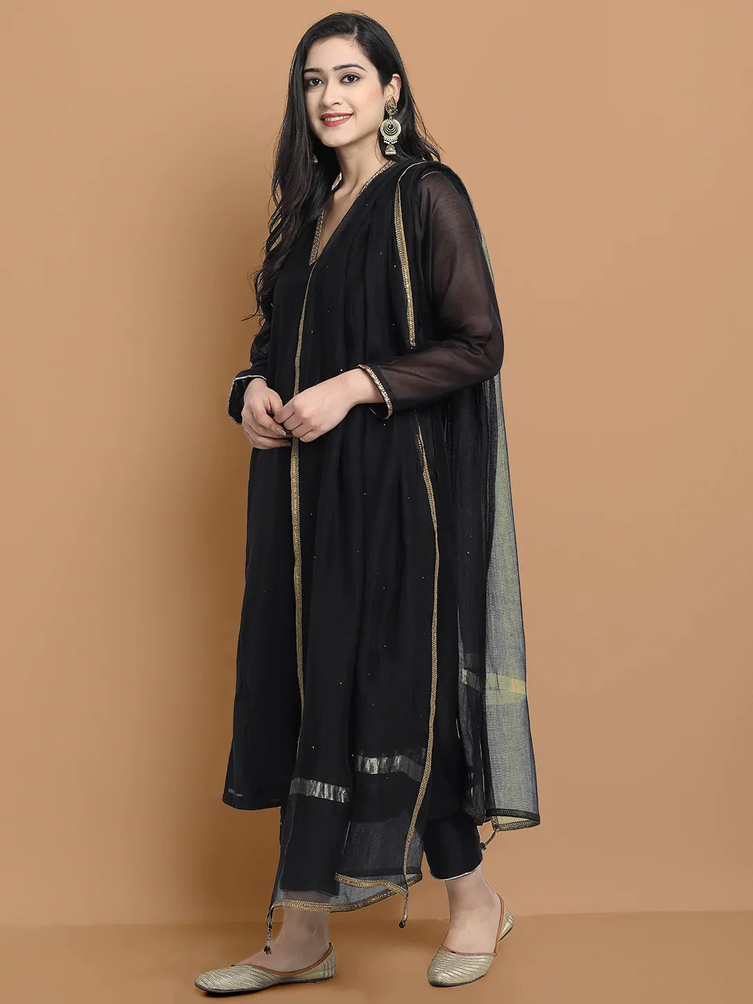 Yarn dyed chanderi kurta accentutated with hand embroidery at the neck area and armhole and cuff, paired with cotton pencil pant