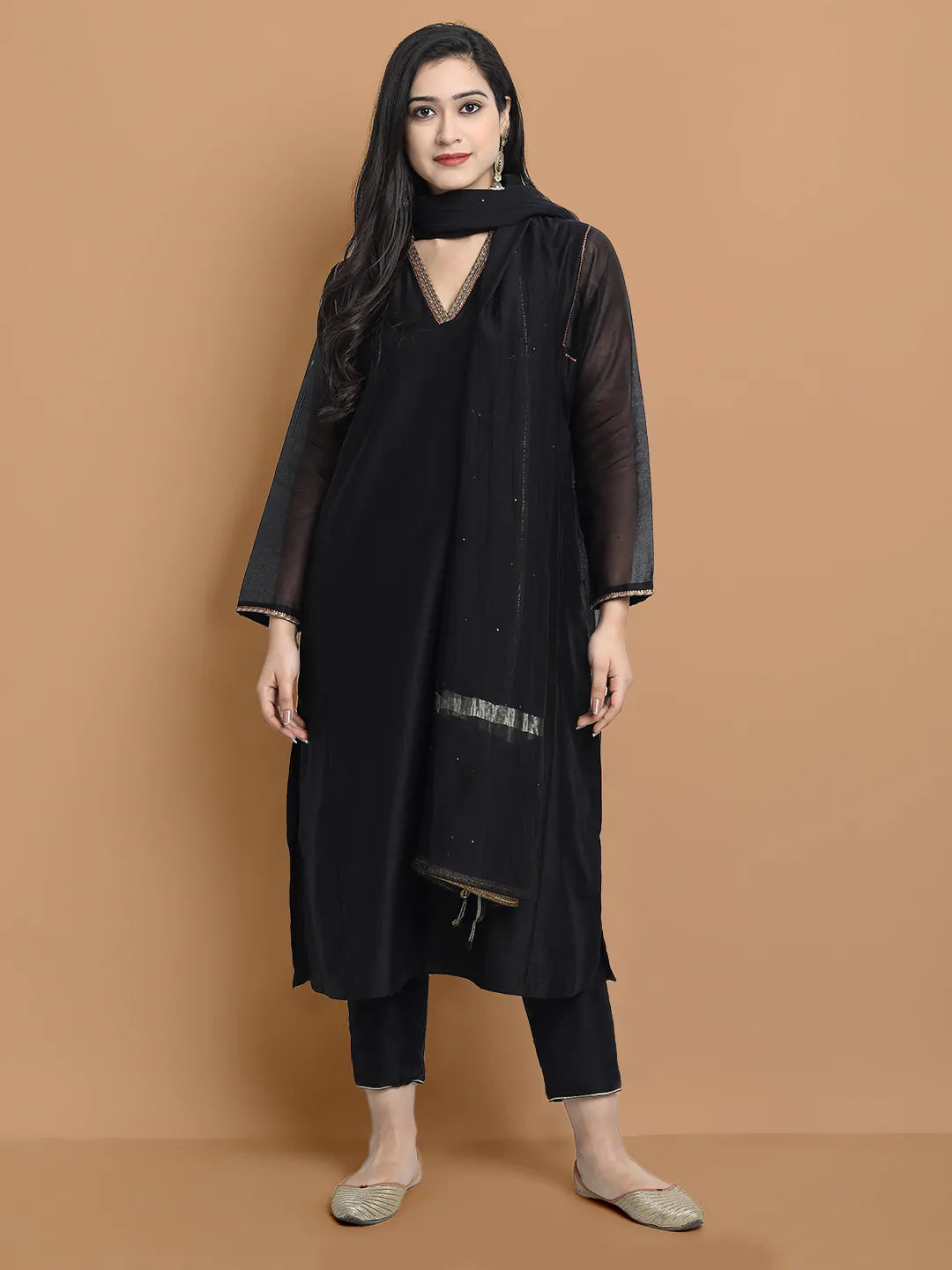 Yarn dyed chanderi kurta accentutated with hand embroidery at the neck area and armhole and cuff, paired with cotton pencil pant