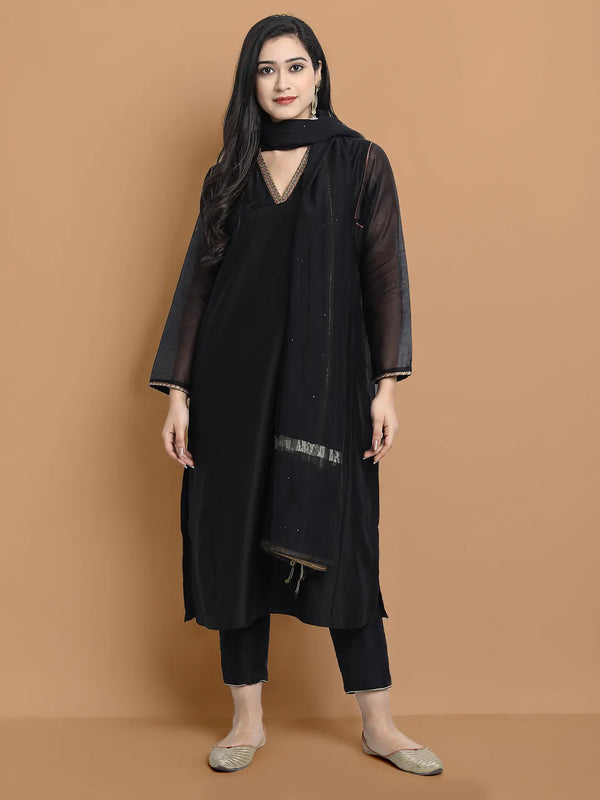 Yarn dyed chanderi kurta accentutated with hand embroidery at the neck area and armhole and cuff, paired with cotton pencil pant
