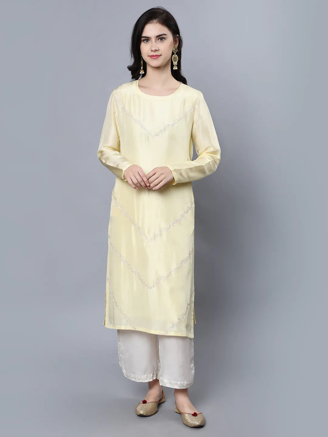 Cupro Silk Kurta with resham embroidery on front panel Paired with Ivory palazzo with embroidery at side slit covering hem