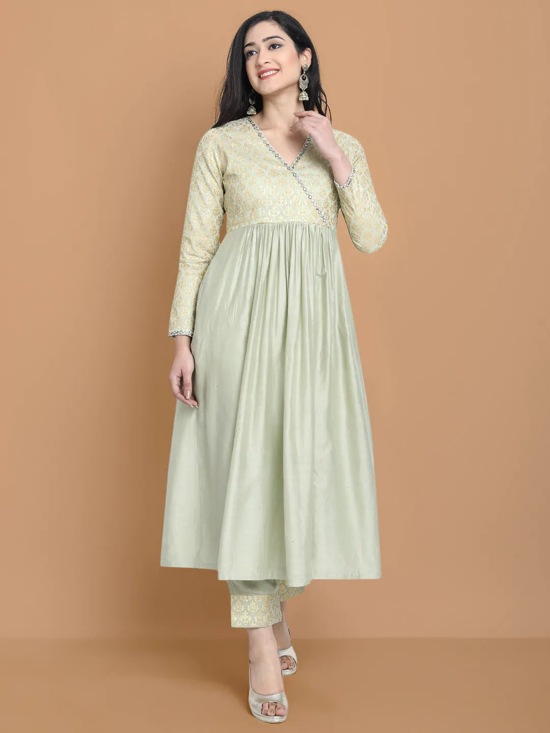 Hand embroidered dress made in combination with silk jacquard and silk chanderi , paired with bemberg cotton trouser