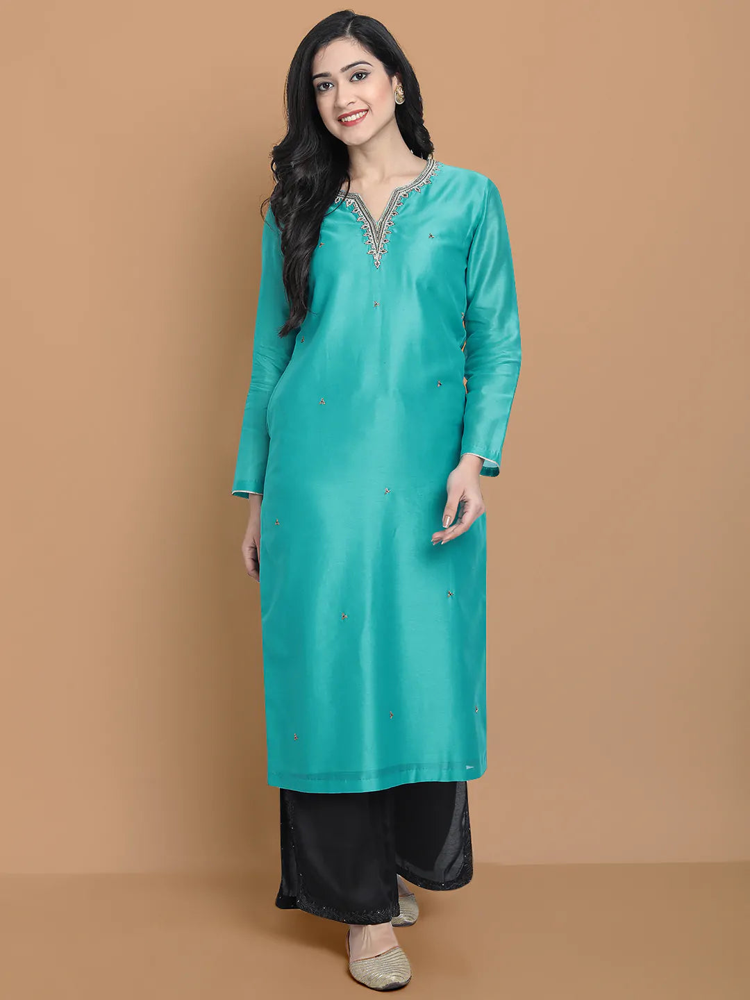 Royal blue silk chanderi kurta , accentuated with exquiste zari embroidery , mixture of hand and machine , sprinkled all over , paired with zari net dupata and modal satin slit plazo