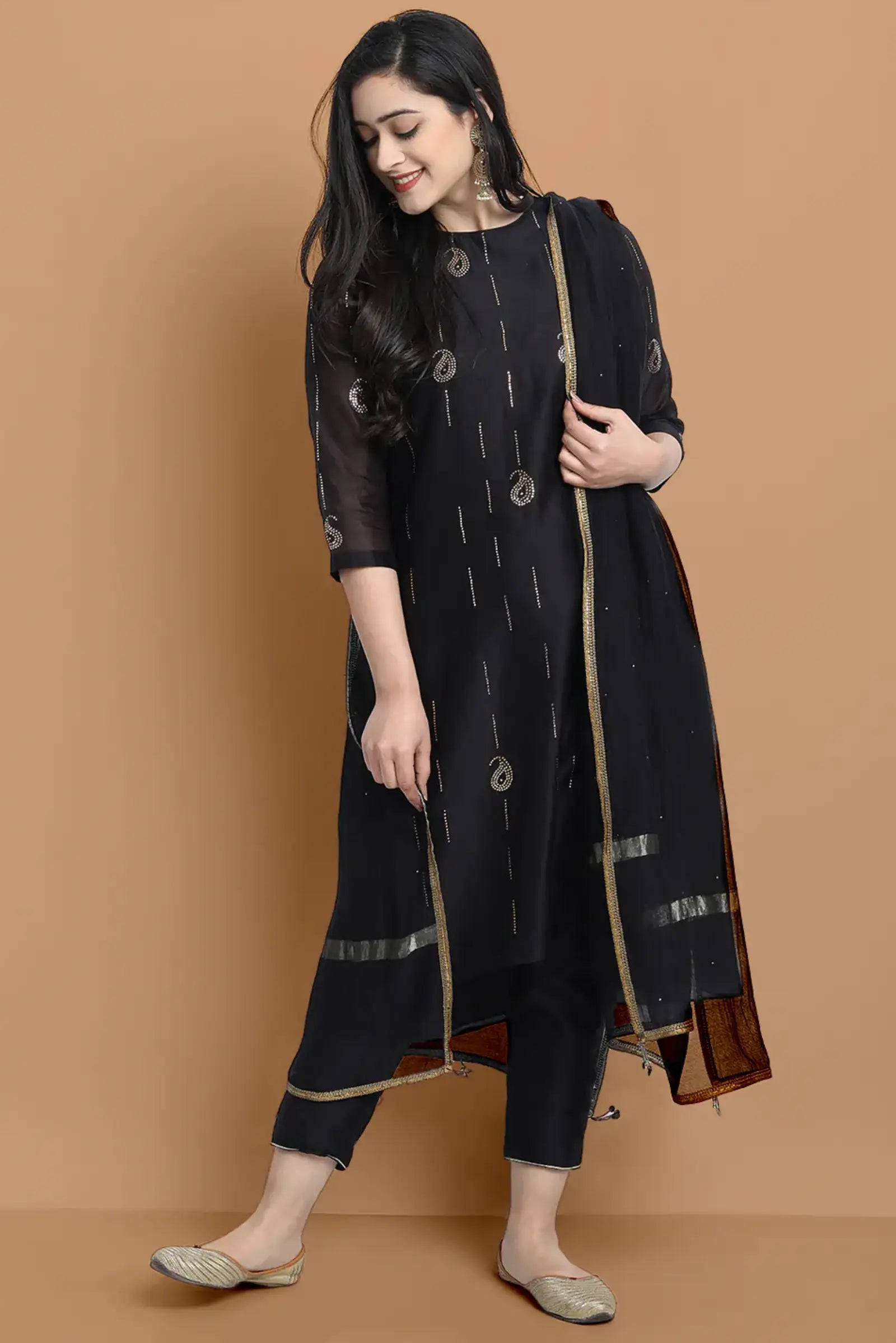 Yarn dyed cupro silk chanderi kurta highligted with mukaish hand work all over , paired with cotton trouser and zari chanderi net dupatta
