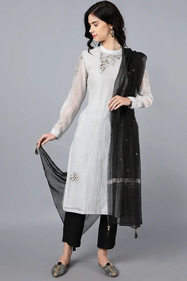 Chanderi kurta with resham and badla embroidery paired with chanderi pencil pants