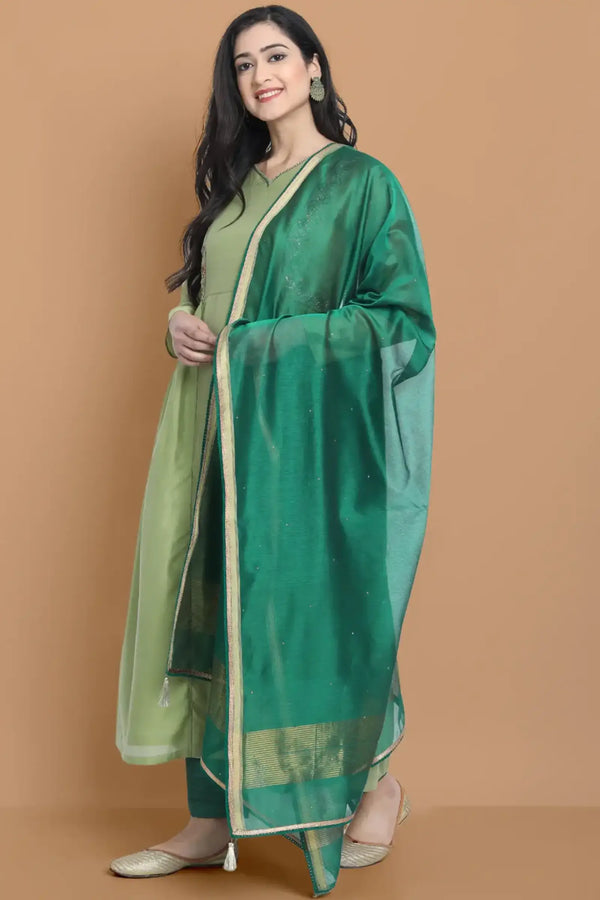 Light green silk chanderi kurta accentuated with exquisite hand embroidery and got emb at the neck , paired with cotton trouser
