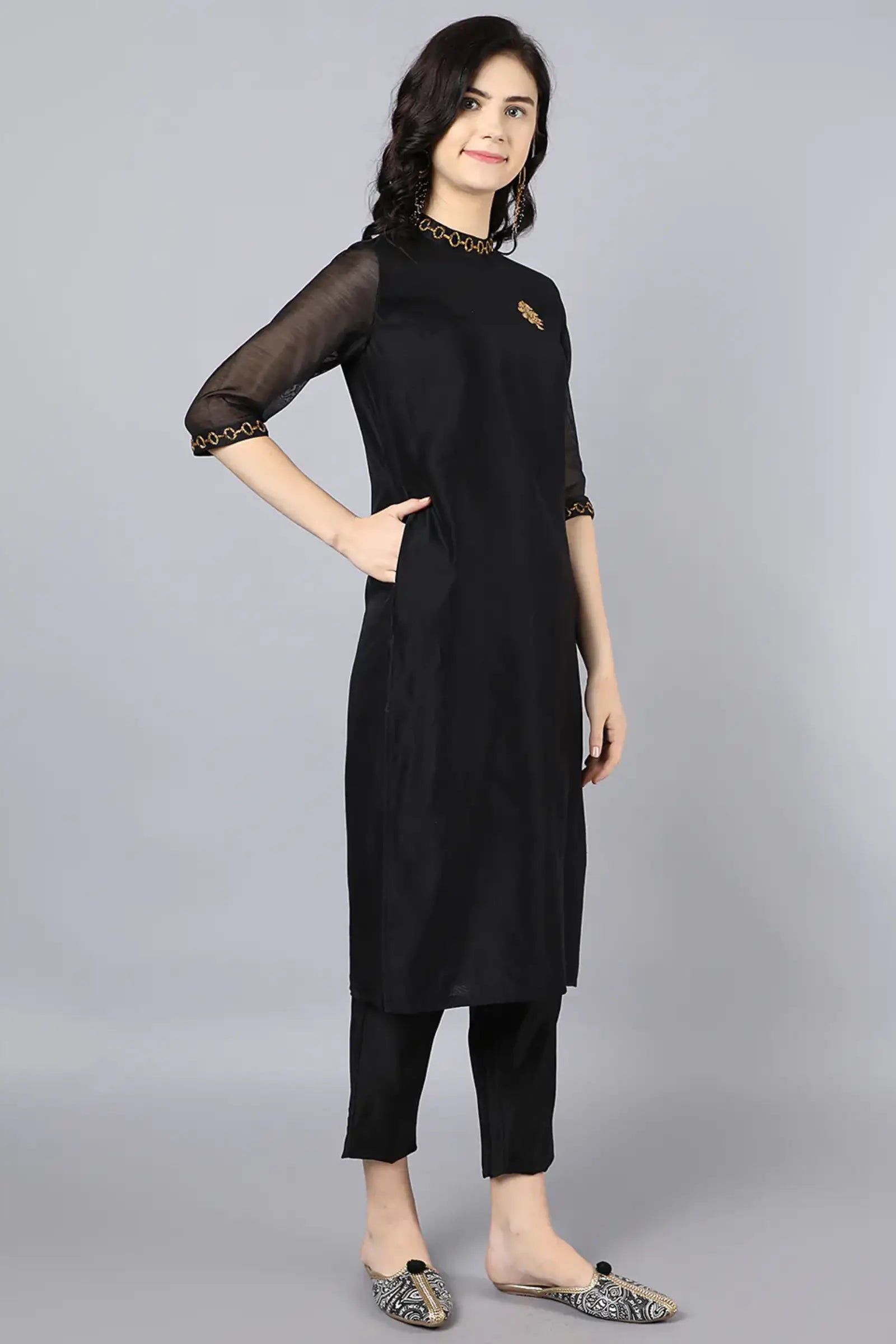 Chanderi kurta with dabka embroidery at neck and sleeves Paired with cotton pencil pant
