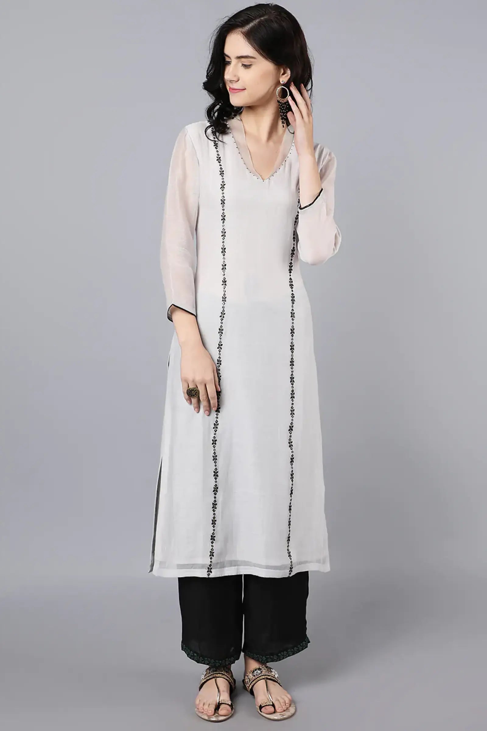 Chanderi kurta with resham and badla embroidery paired with farshi