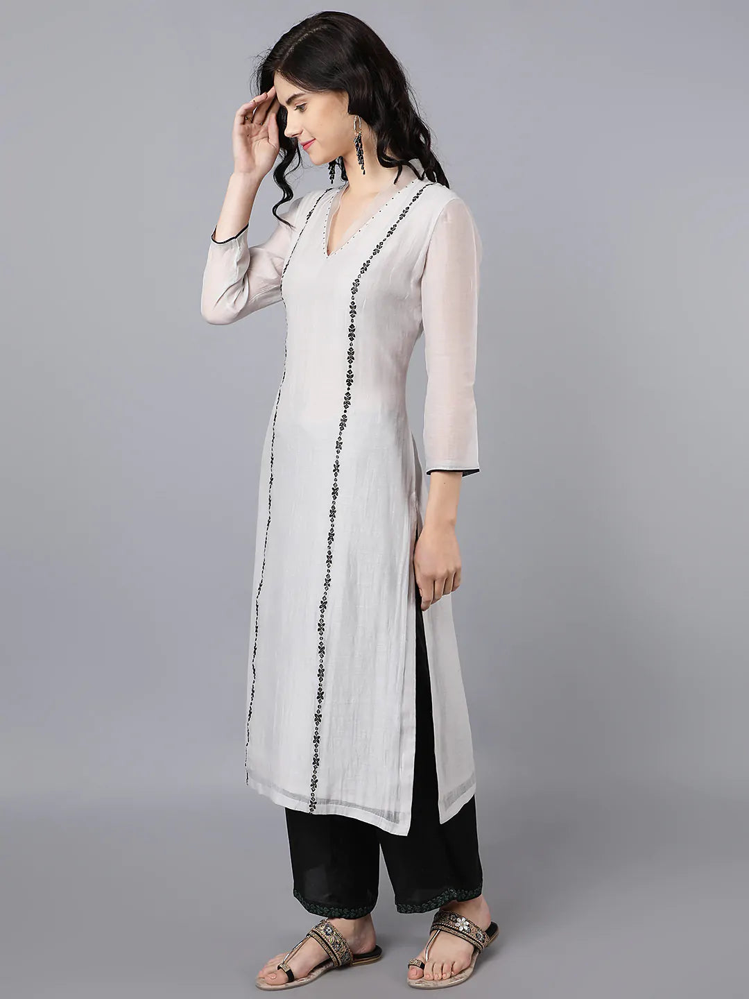 Chanderi kurta with resham and badla embroidery paired with farshi