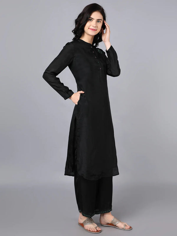 Cupro silk kurta with embroidered buta on chest Paired with embroided black farshi in modal satin