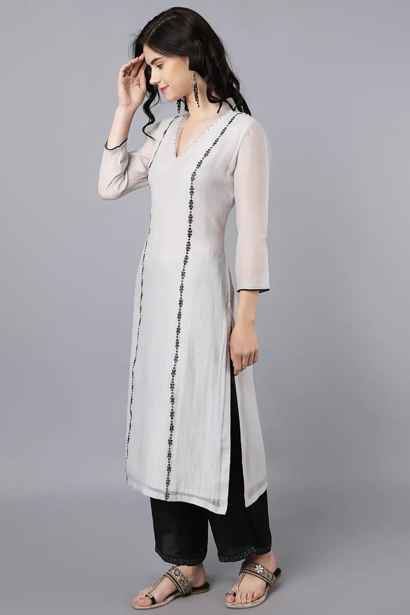 Chanderi kurta with resham and badla embroidery paired with farshi