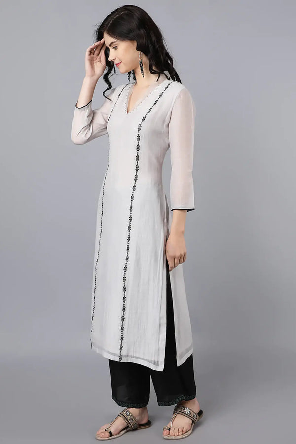 Chanderi kurta with resham and badla embroidery paired with farshi