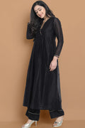 Black silk chanderi Dress Accentuated with Exquisite hand embroidery signifing beauty is in the detailing.