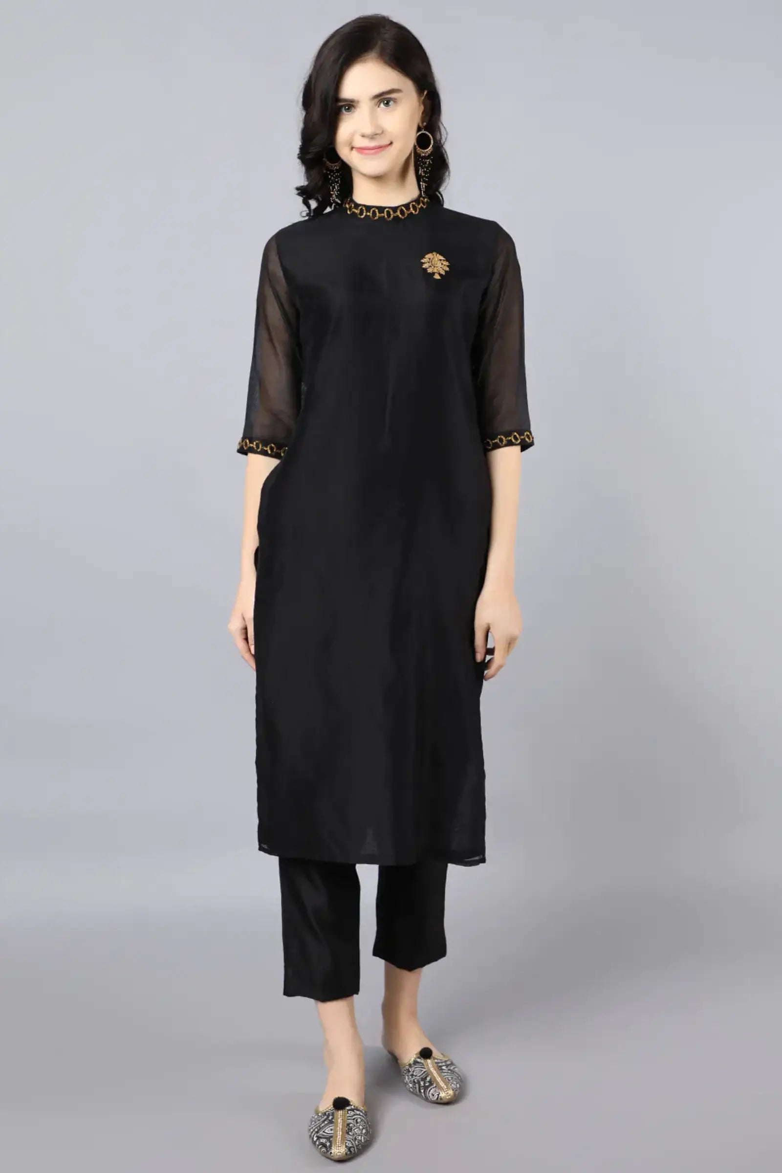 Chanderi kurta with dabka embroidery at neck and sleeves Paired with cotton pencil pant