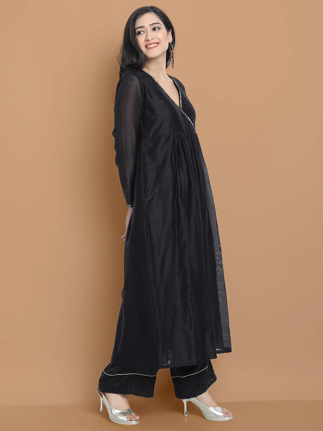 Black Cupro silk chanderi kurta Accentuated with Exquisite hand embroidery paired with pant