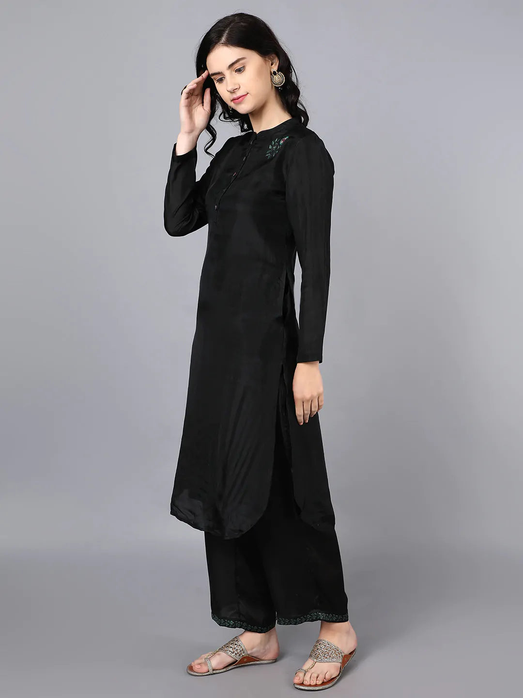 Cupro silk kurta with embroidered buta on chest Paired with embroided black farshi in modal satin