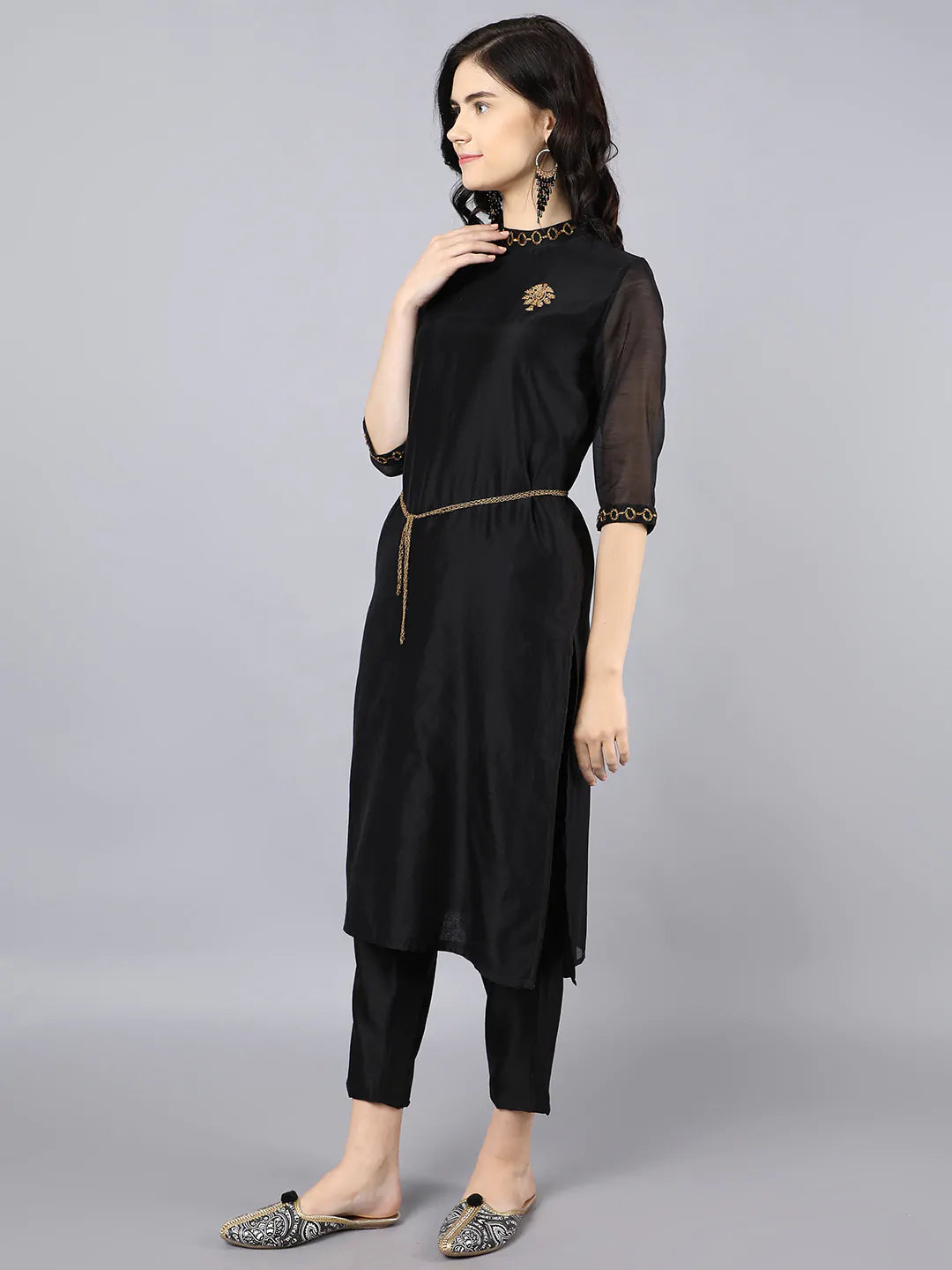 Chanderi kurta with dabka embroidery at neck and sleeves .