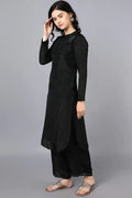 Cupro silk kurta with embroidered buta on chest Paired with embroided black farshi in modal satin