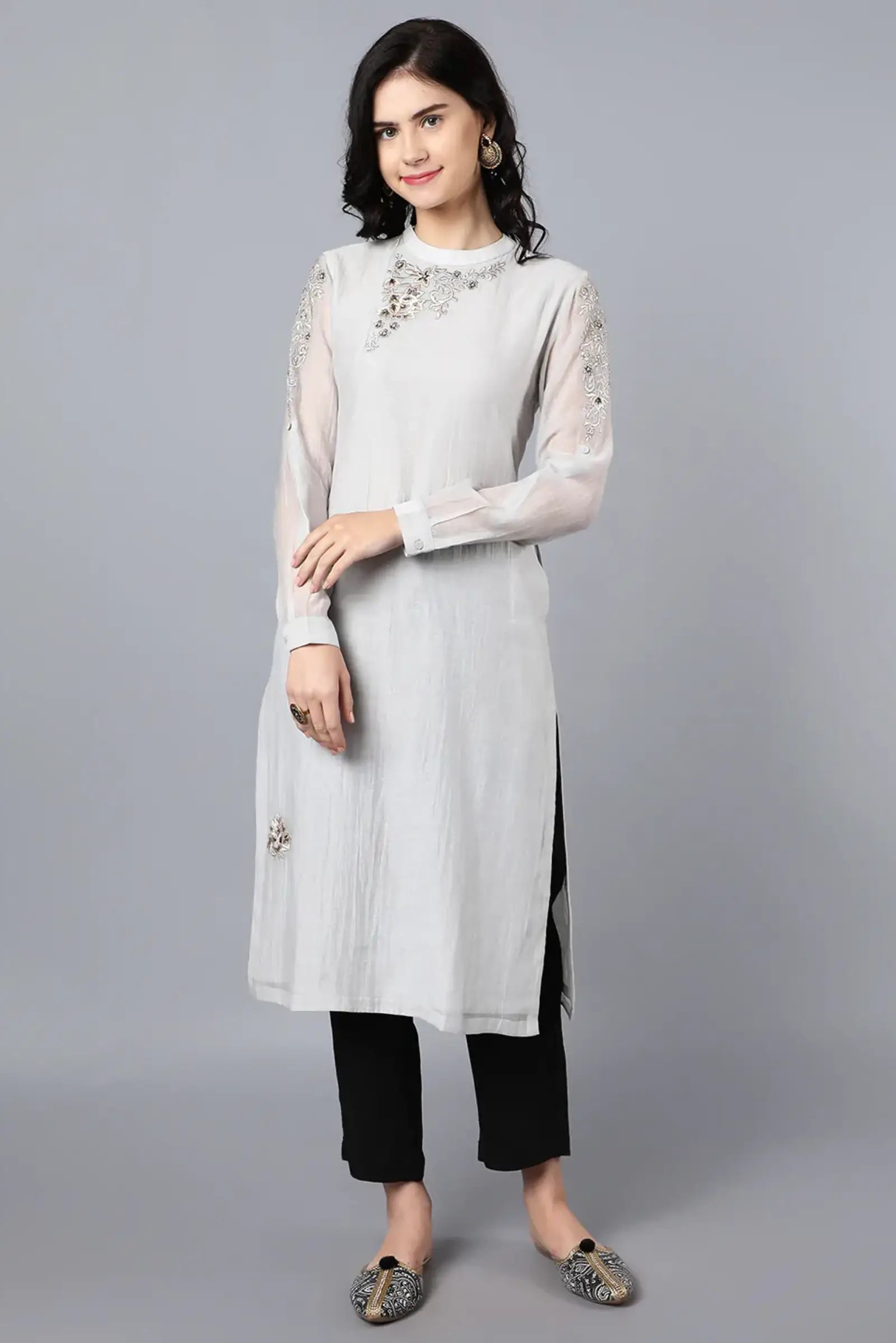 Chanderi kurta with resham and badla embroidery paired with chanderi pencil pants