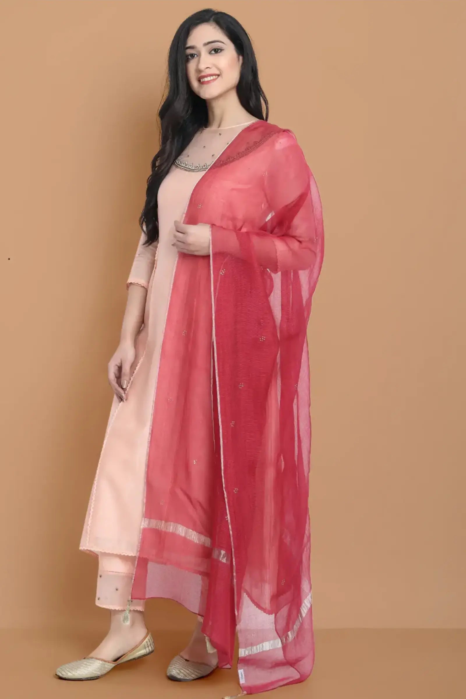 Yarn dyed chanderi kurta accentutated with hand machine embroidery on the textured shoulder yoke, paired with embroidered cotton trouser