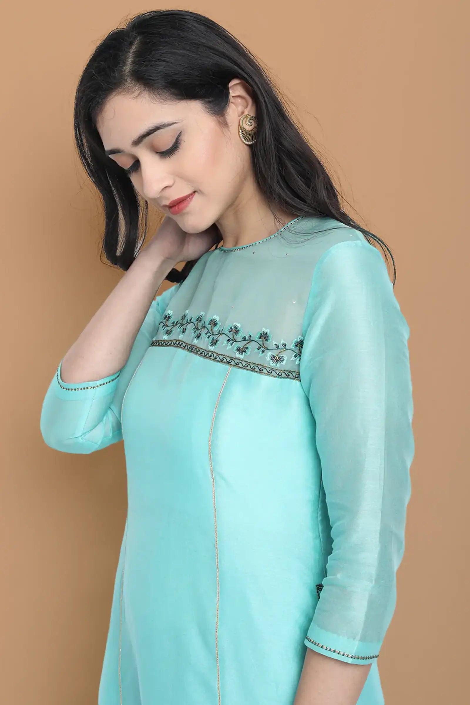 Pastel blue high low kurta with hand and machine embroidery , paired with embroidered wide farshi