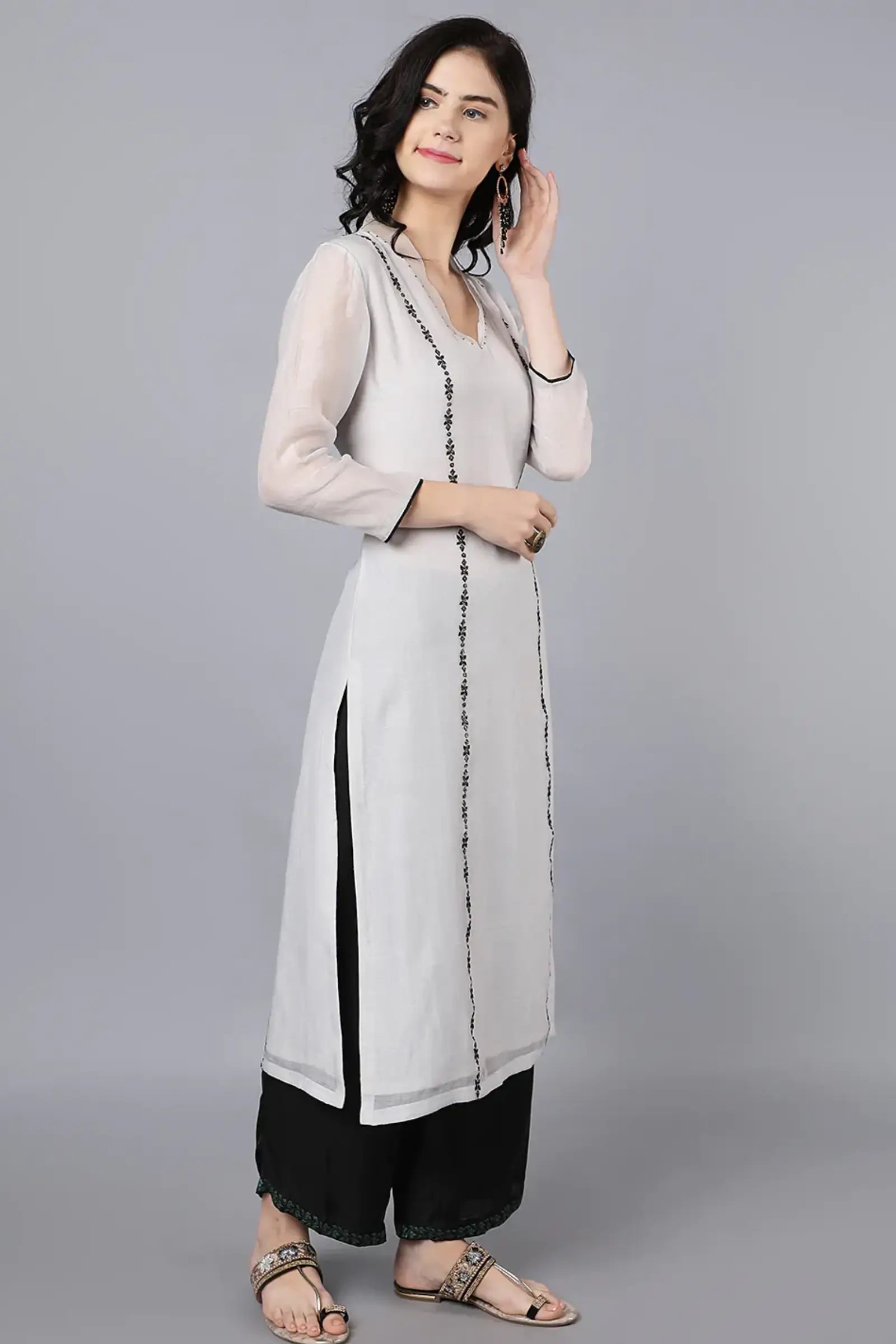 Chanderi kurta with resham and badla embroidery paired with farshi