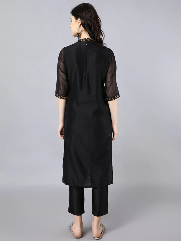 Chanderi kurta with dabka embroidery at neck and sleeves .