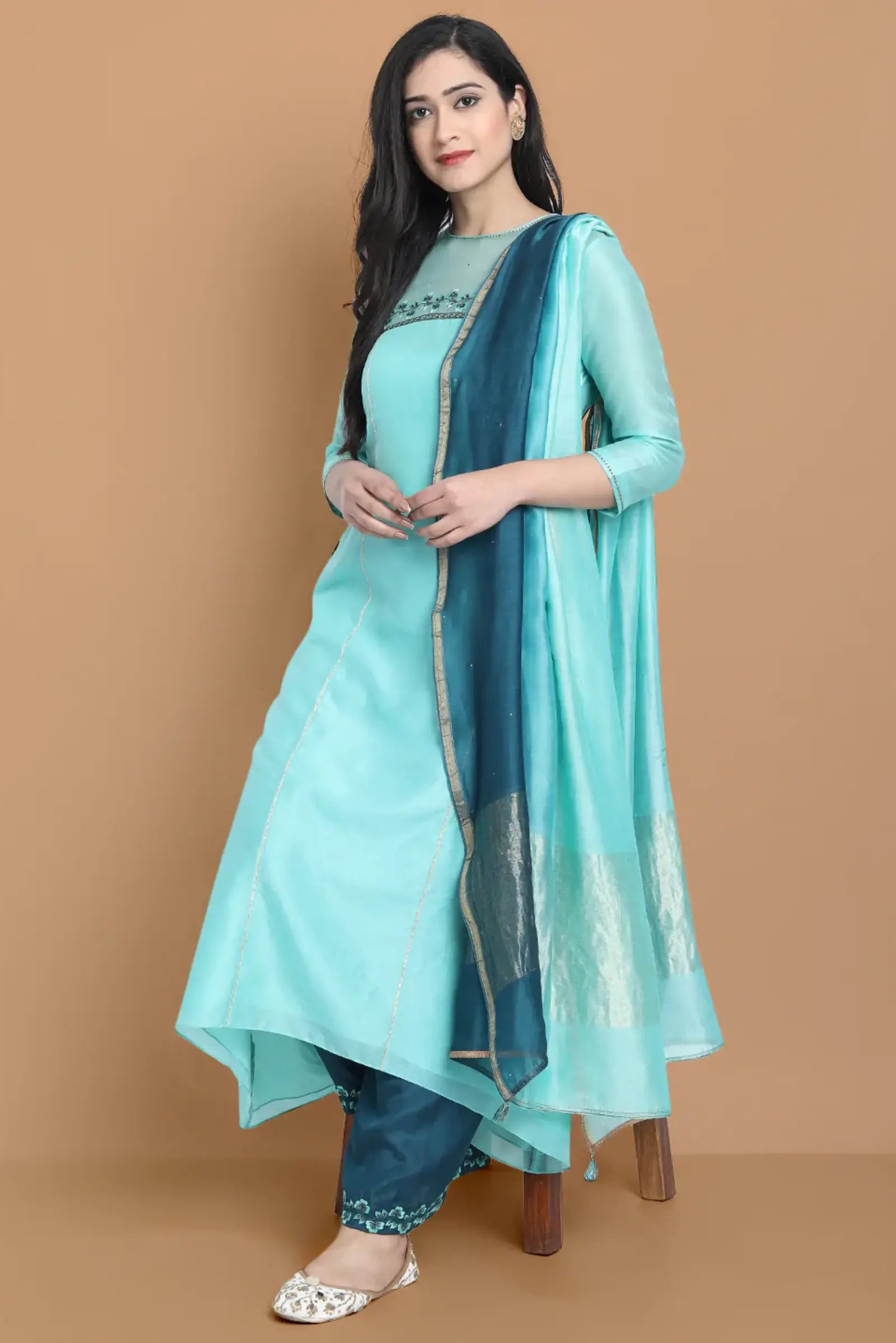 Pastel blue high low kurta with hand and machine embroidery , paired with embroidered wide farshi