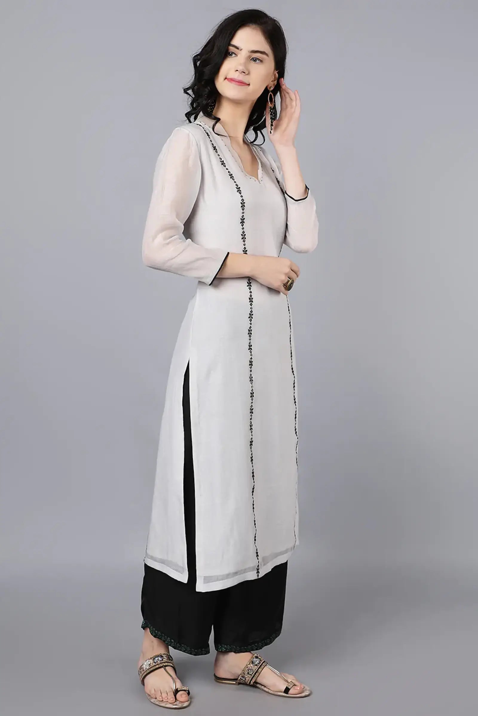 Chanderi kurta with resham and badla embroidery paired with farshi