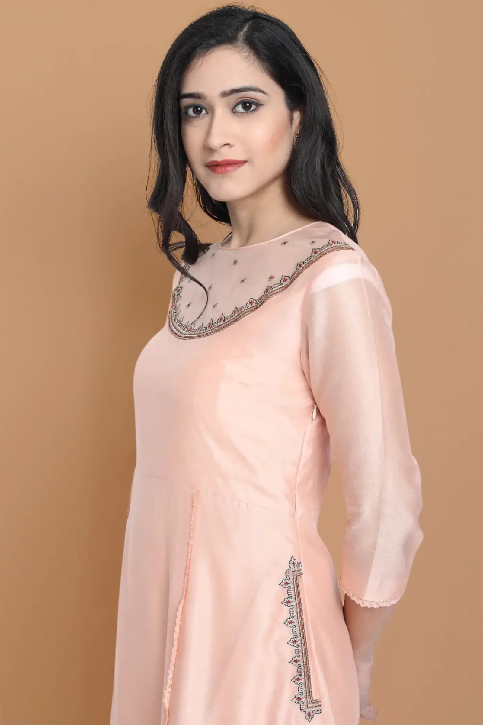 Yarn dyed chanderi kurta accentutated with hand machine embroidery on the textured shoulder yoke