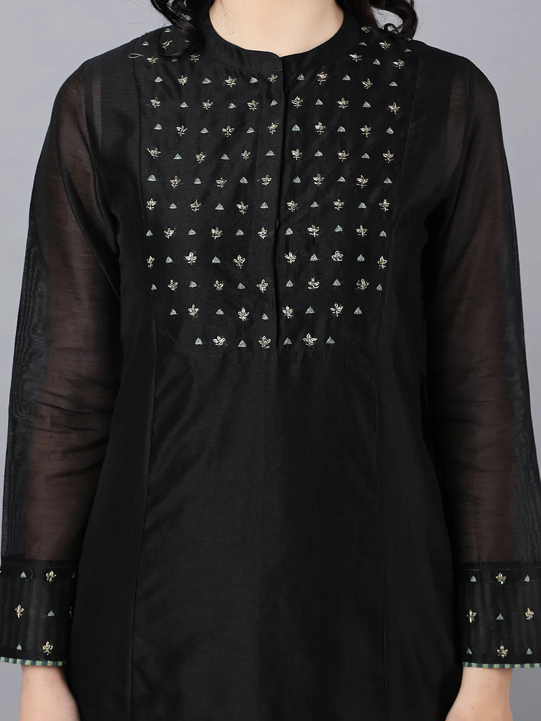Chanderi kurta black with hand embroidery on yoke paired with black trouser