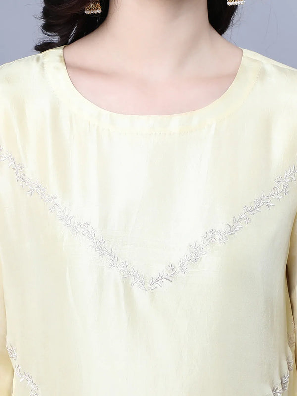 Cupro Silk Kurta with resham embroidery on front panel Paired with Ivory palazzo with embroidery at side slit covering hem