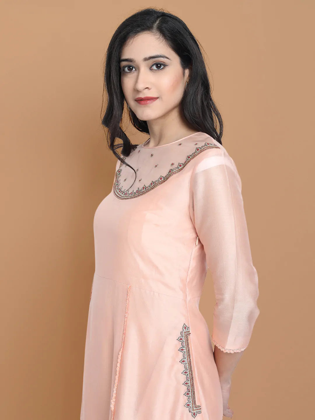 Yarn dyed chanderi kurta accentutated with hand machine embroidery on the textured shoulder yoke