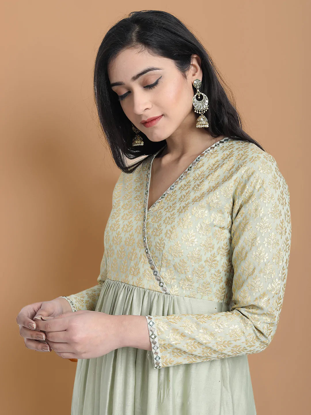 Hand embroidered dress made in combination with silk jacquard and silk chanderi , paired with bemberg cotton trouser