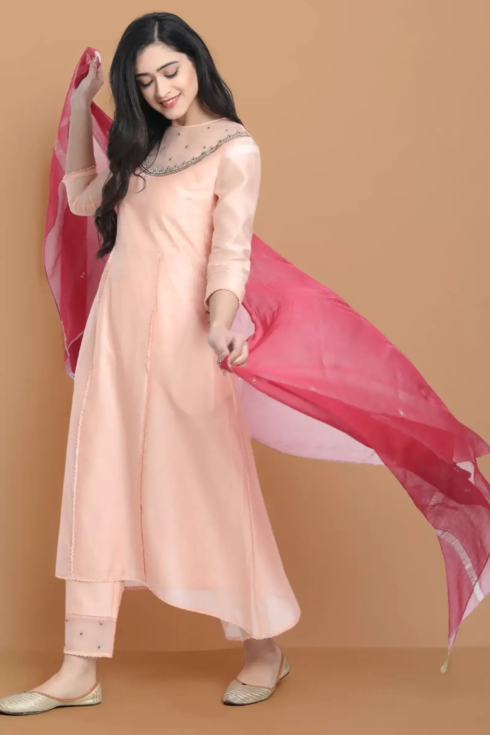 Yarn dyed chanderi kurta accentutated with hand machine embroidery on the textured shoulder yoke, paired with embroidered cotton trouser