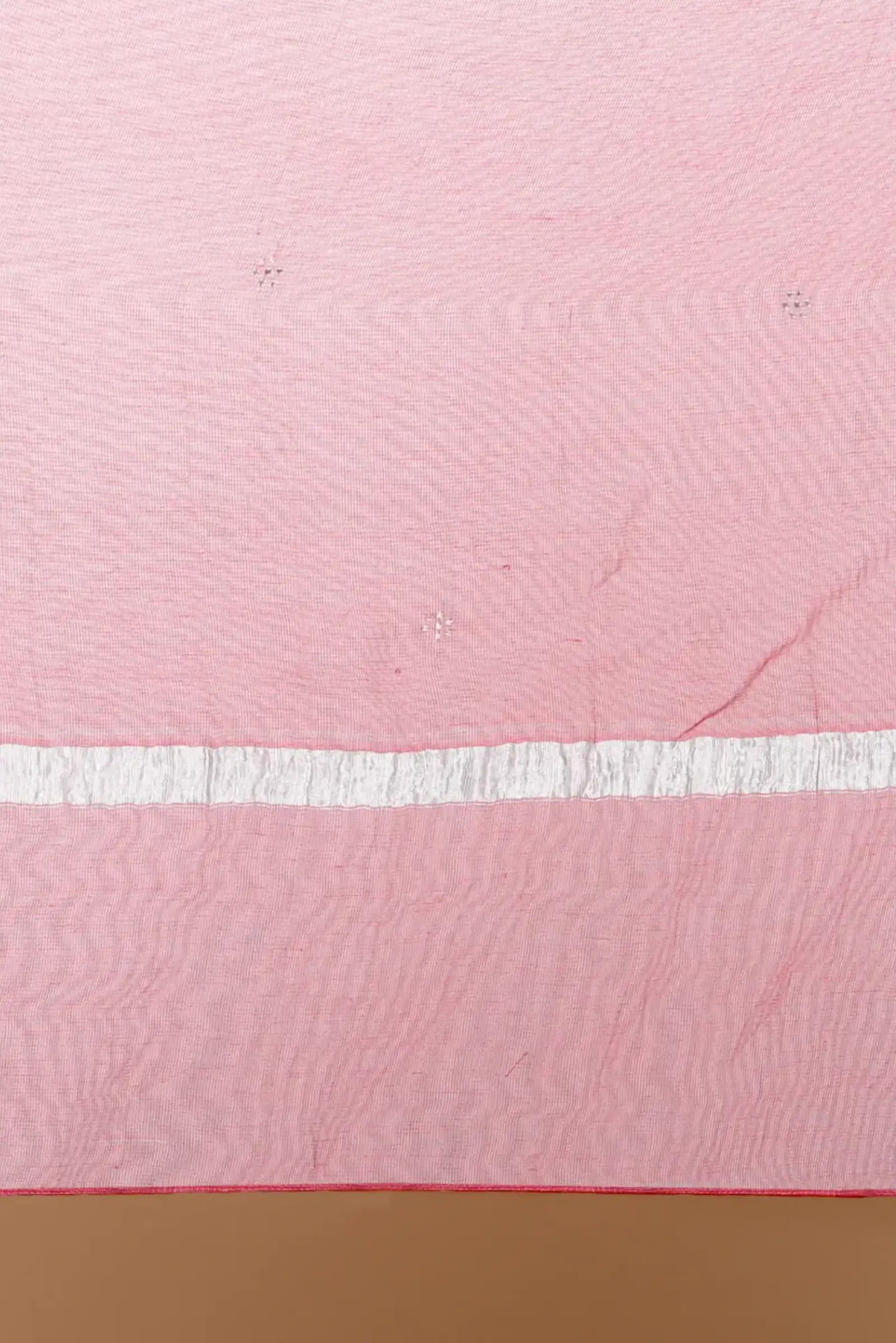 Yarn dyed chanderi kurta accentutated with hand machine embroidery on the textured shoulder yoke, paired with embroidered cotton trouser
