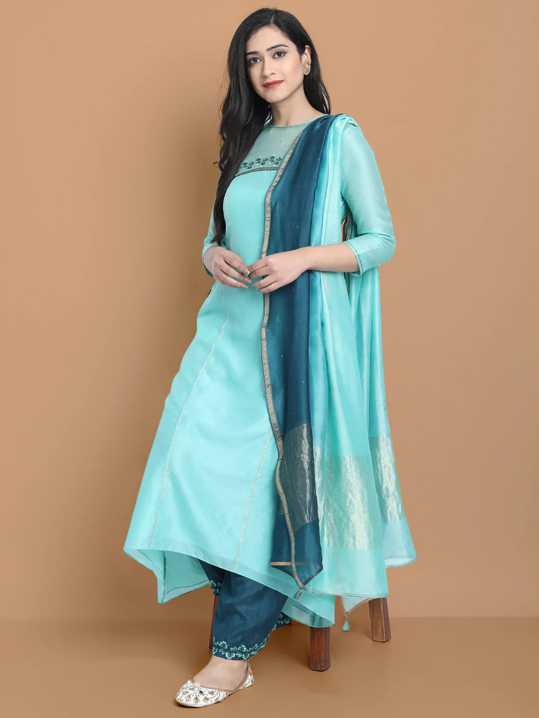 Pastel blue high low kurta with hand and machine embroidery , paired with embroidered wide farshi