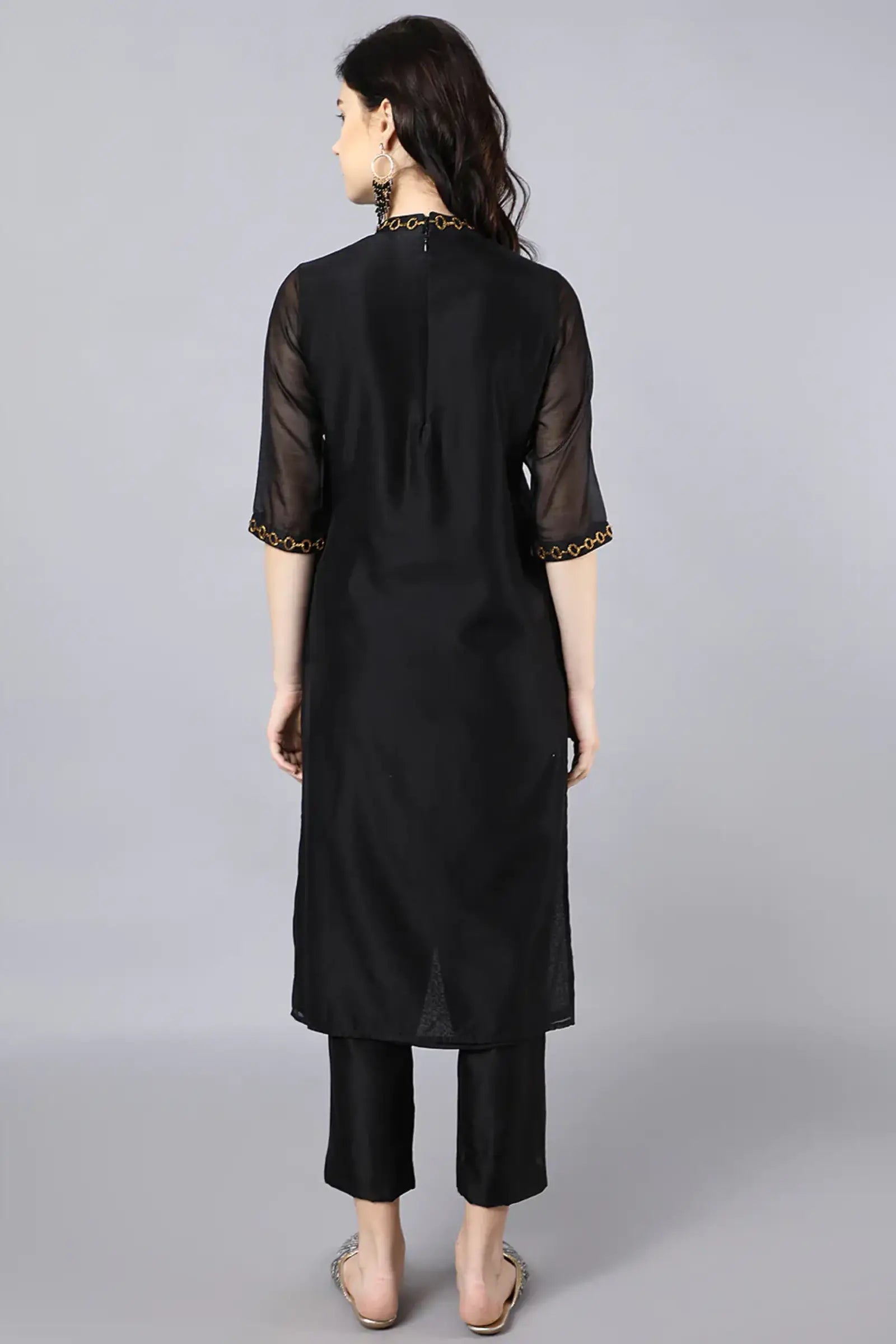 Chanderi kurta with dabka embroidery at neck and sleeves Paired with cotton pencil pant