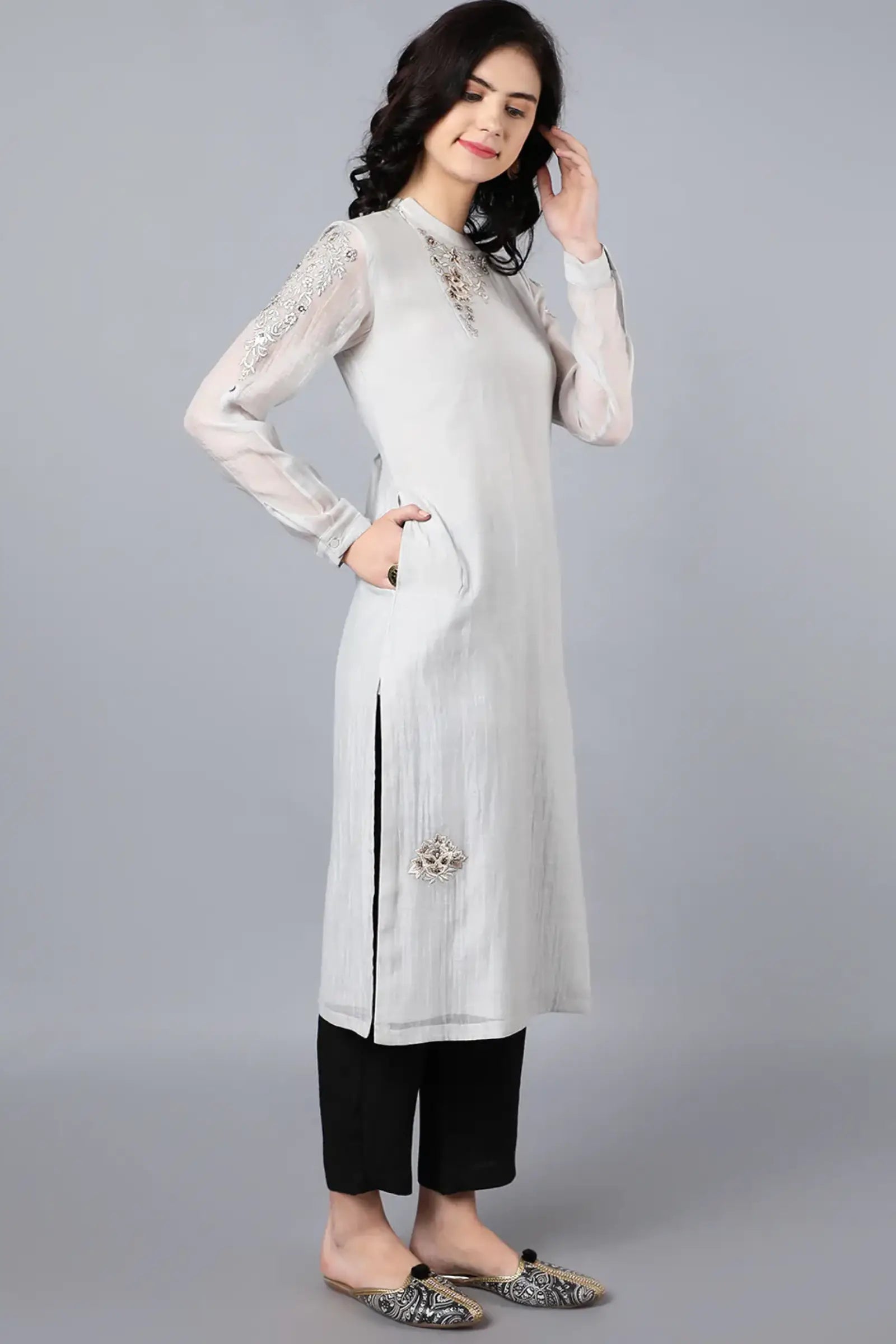Chanderi kurta with resham and badla embroidery paired with chanderi pencil pants