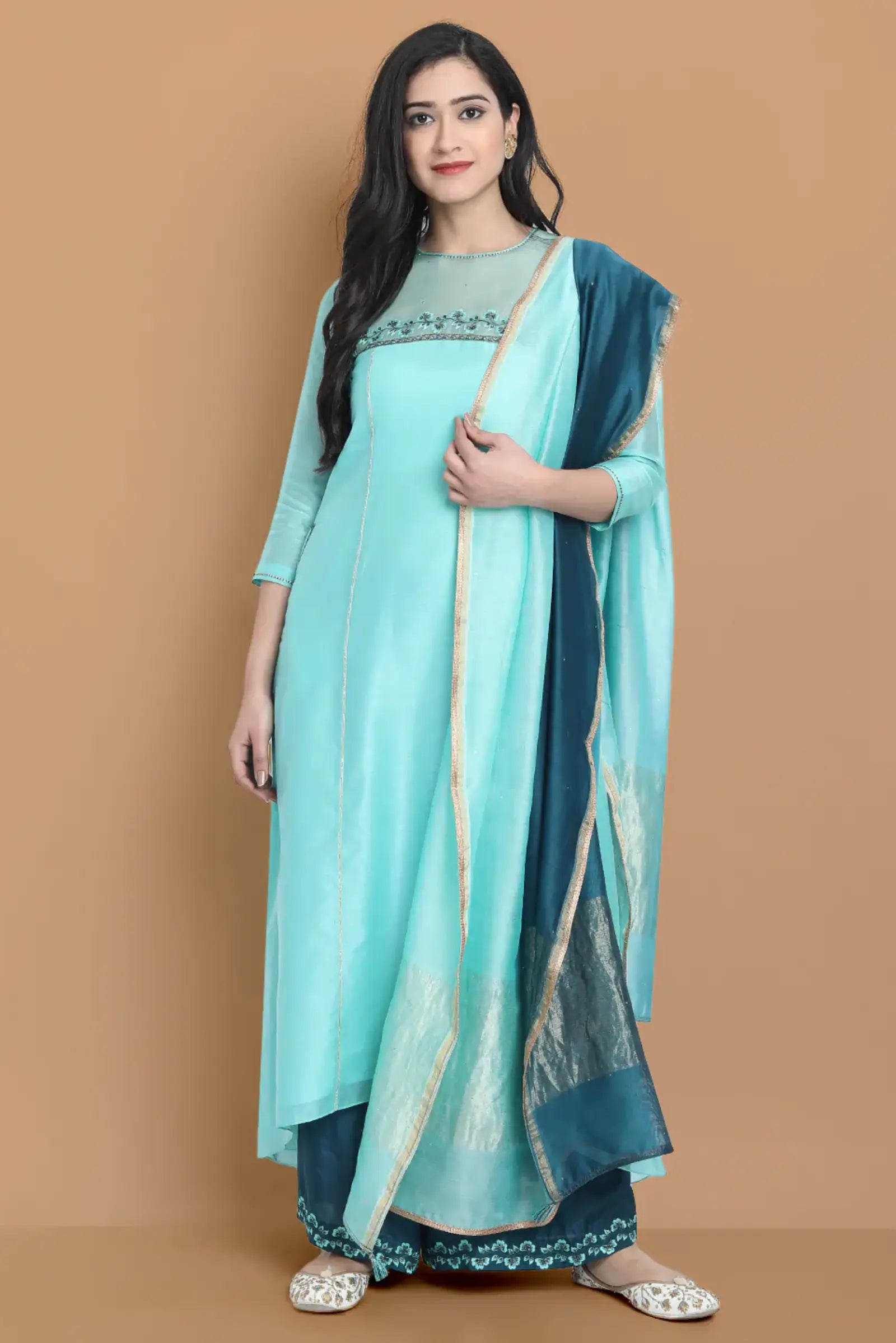 Pastel blue high low kurta with hand and machine embroidery , paired with embroidered wide farshi