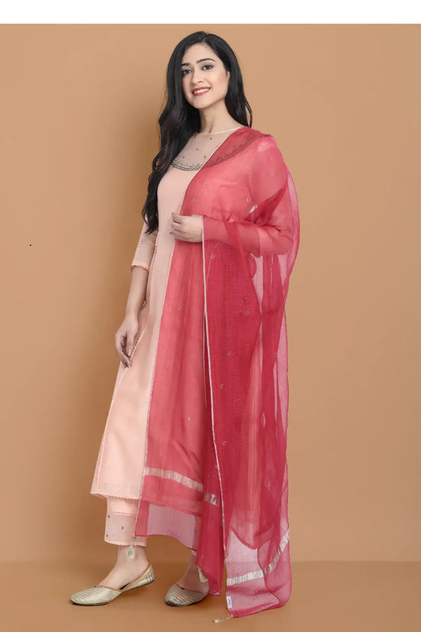 Yarn dyed chanderi kurta accentutated with hand machine embroidery on the textured shoulder yoke, paired with embroidered cotton trouser