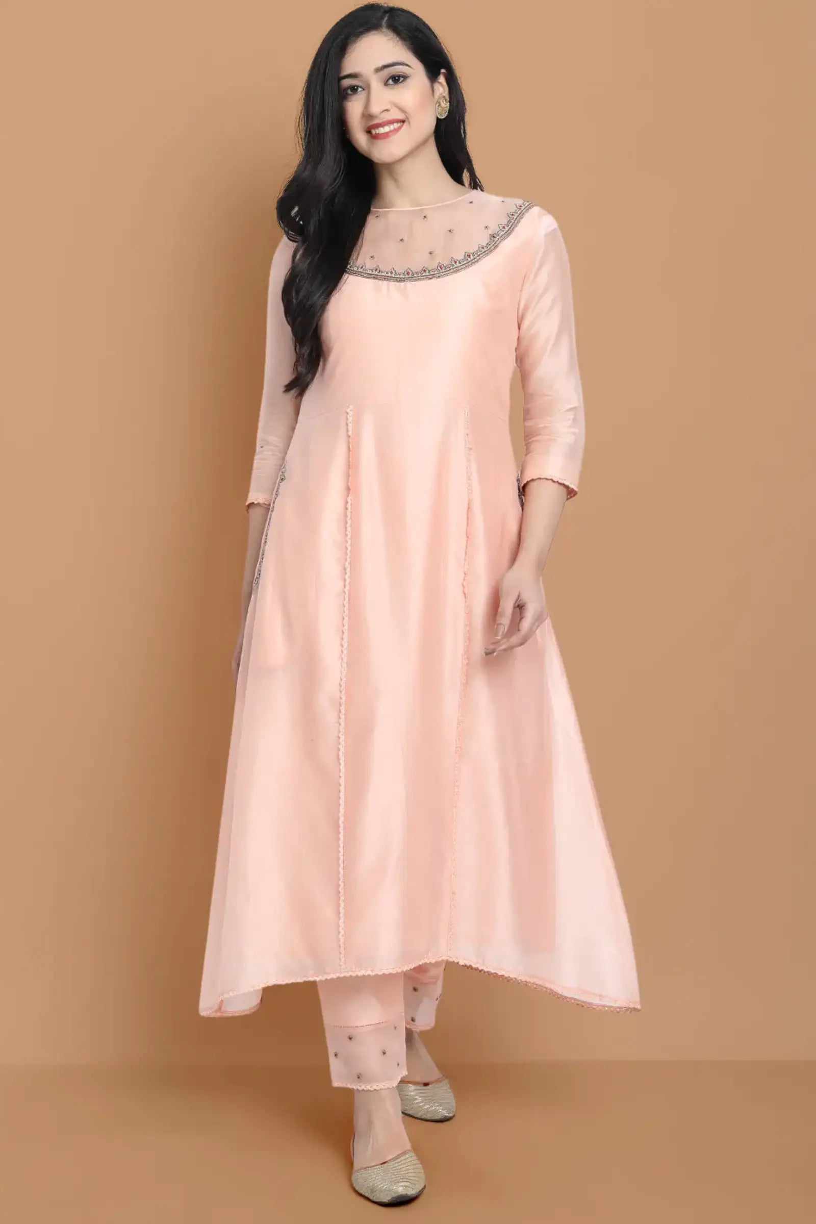 Yarn dyed chanderi kurta accentutated with hand machine embroidery on the textured shoulder yoke