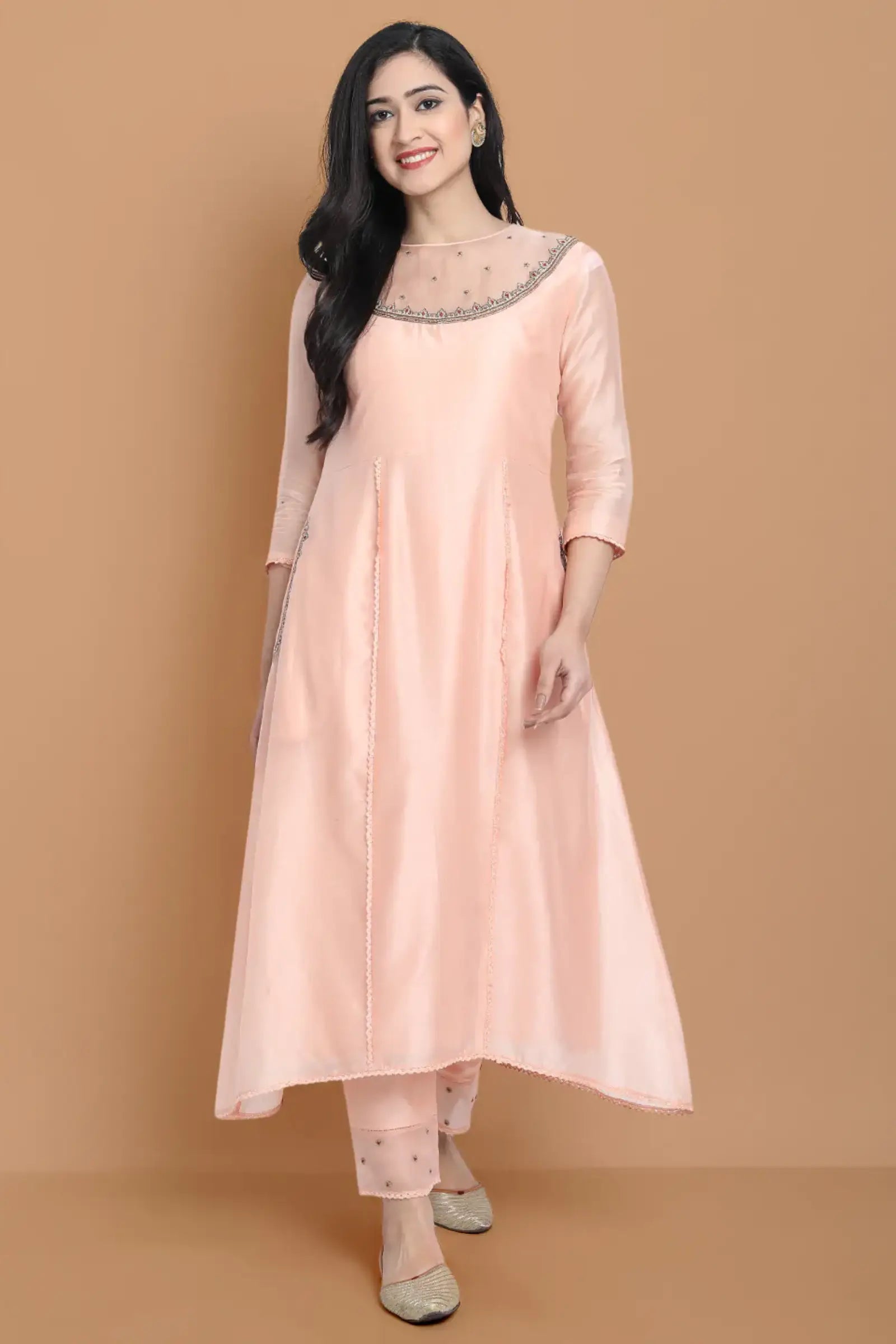 Yarn dyed chanderi kurta accentutated with hand machine embroidery on the textured shoulder yoke