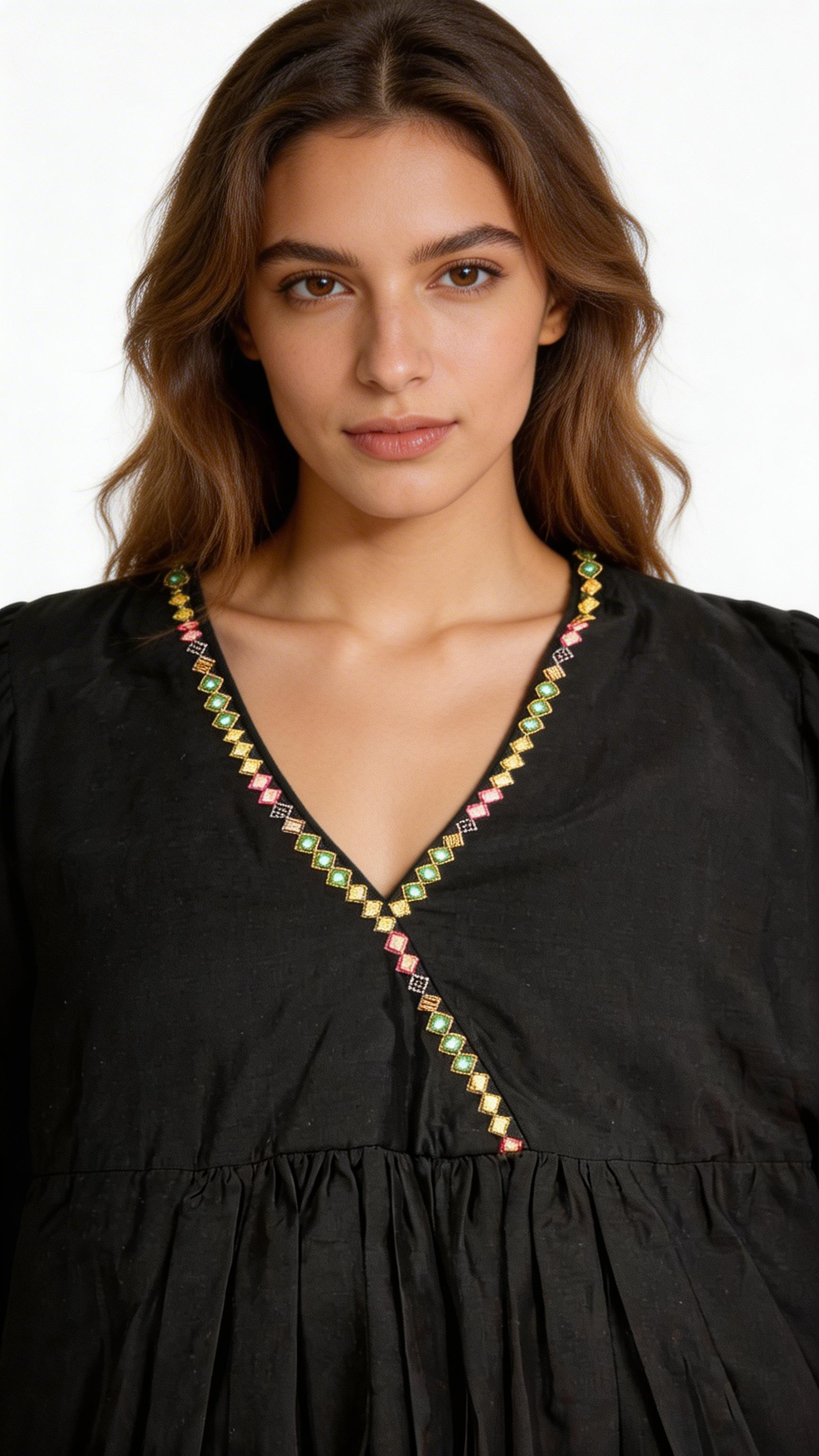 Black silk chanderi Dress Accentuated with Exquisite hand embroidery signifing beauty is in the detailing.