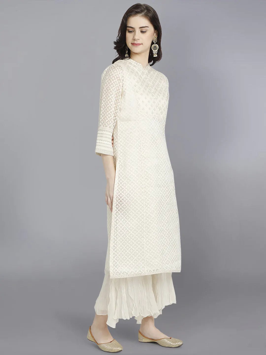 Ivory kurta in jaqaurd paired with crincled palazo